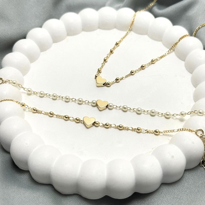 Pulseira 14+2cm Perolas C/ Coração Liso Passante